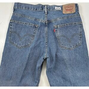 Vintage Levi's 550 Blue Relaxed Fit Jeans Men's Act 33x34 Medium Wash Cotton Y2K